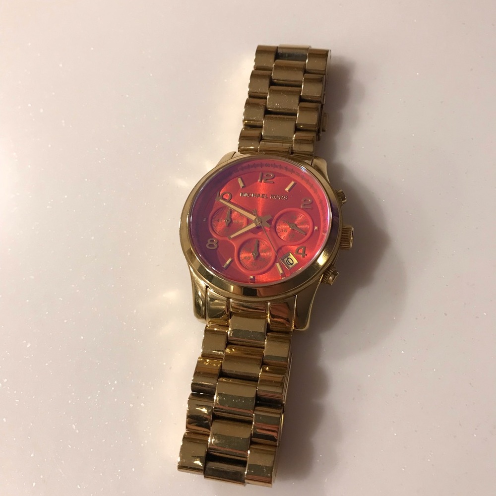 Orange iridescent Michael kors watch